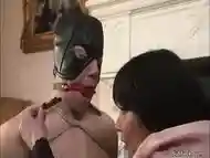 Brunette femdom pegging masked slave