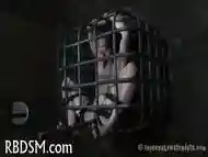 Caged Babe Forced To Give Blowjob