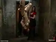 Dyke upside down suspended and flogged