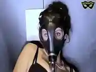 Gas Mask Lady Sprinkles Incredible Amount of Pee