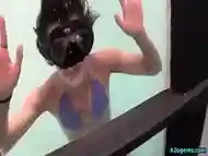 Girl Drowning in Tank